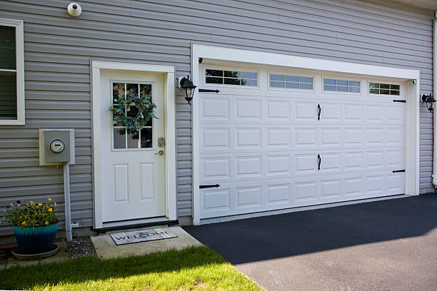 24/7 Emergency Garage Door Panel Replacement experts in Stockton, KS